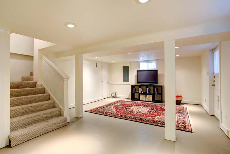 House interior. Basement room with TV